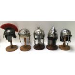 5 miniature replica Roman, Saxon, Norman helmets.