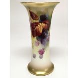 A Royal Worcester trumpet form vase painted with a