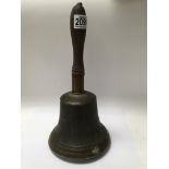 A large brass hand bell, 33cm.