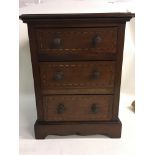 An Edwardian mahogany apprentice chest fitted with