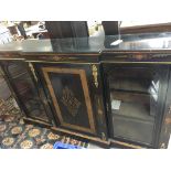 A large Victorian breakfront bookcase with walnut
