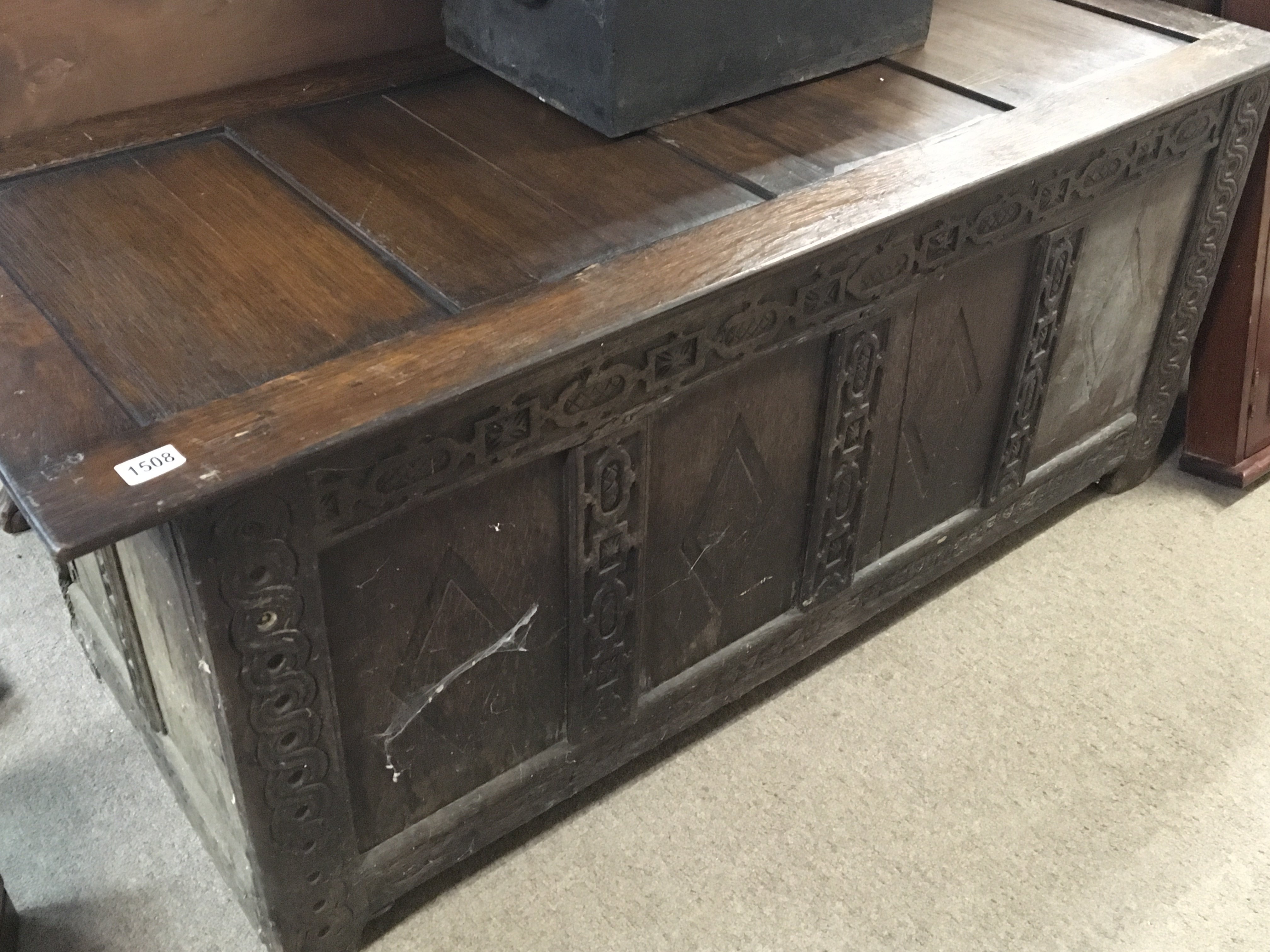 An 18th century English carved oak and panelled ch