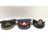 Three military/police hats from Tower of London Yeoman Warders. Provided with letter of