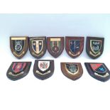 9 x various military plaques presented to Yeoman Warders. Provided with letter of Authenticity.