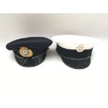 Pair of military hats from Tower of London Yeoman Warders. Provided with letter of Authenticity.