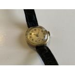 A vintage 9ct gold ladies watch.