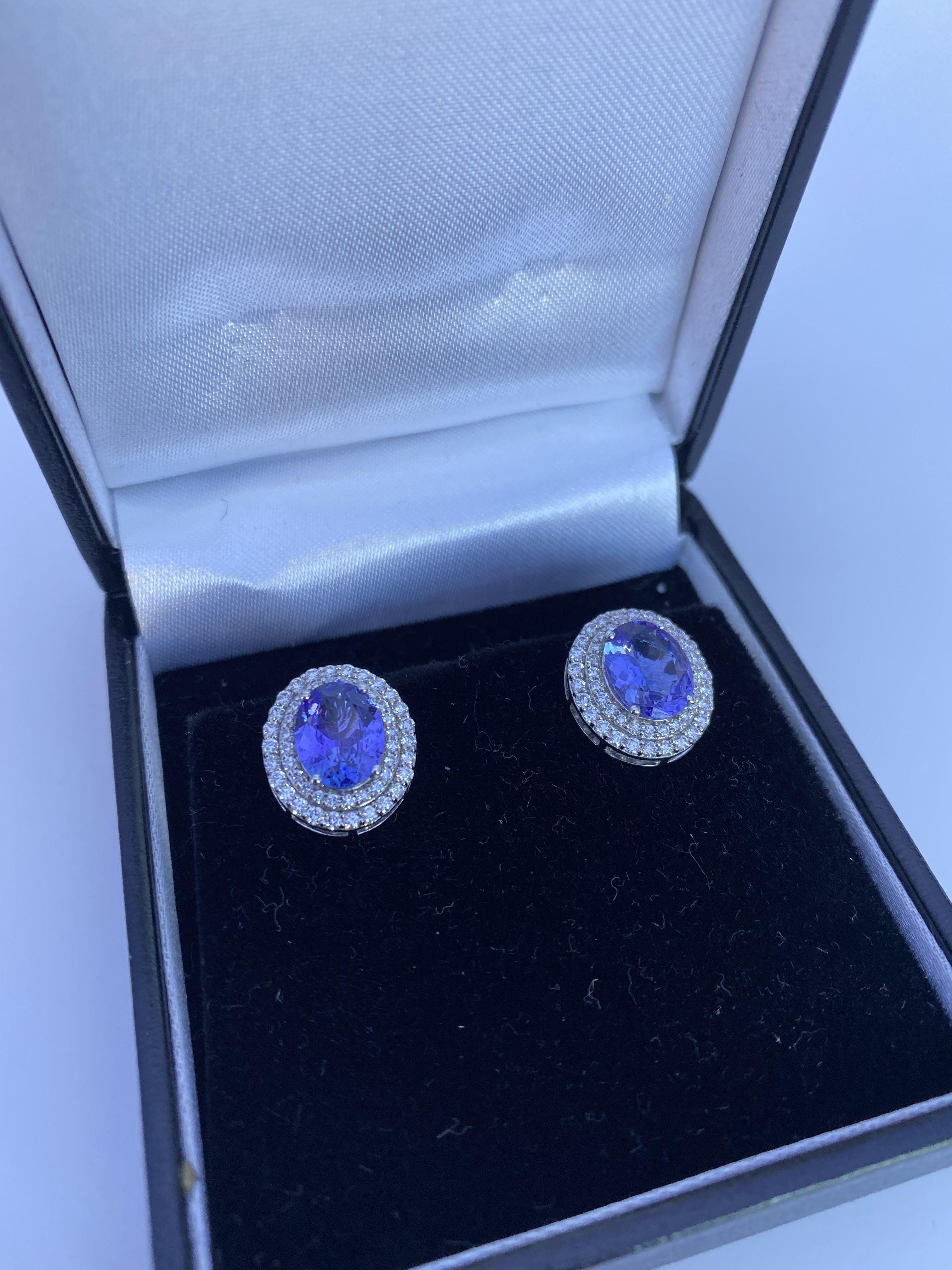 A pair of 18ct white gold large oval cut tanzanite