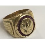 A 14ct gold gents ring with American Eagle emblem.