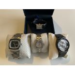 4 boxed wristwatches in working order.