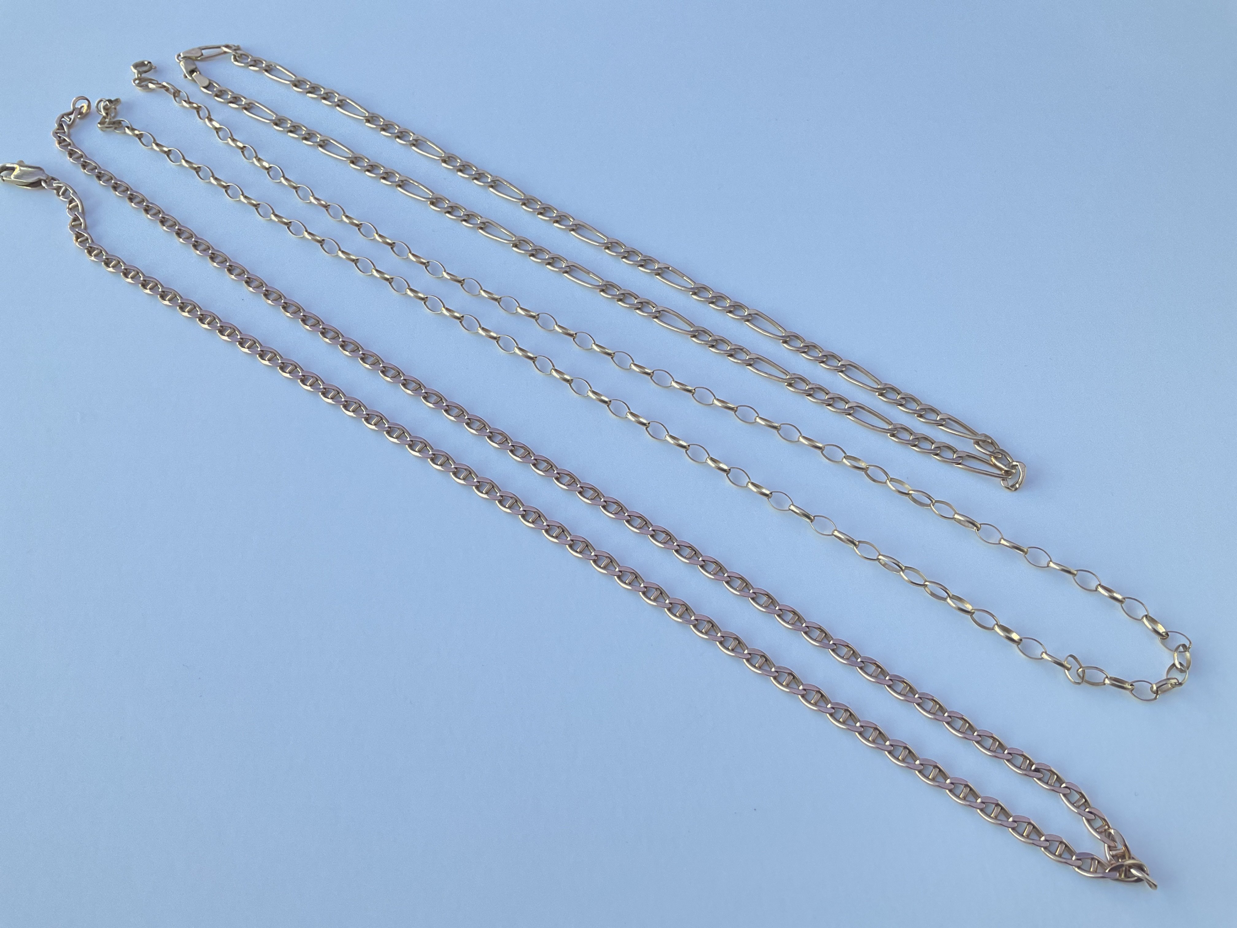 Three 9ct gold necklaces. Approx 36g.