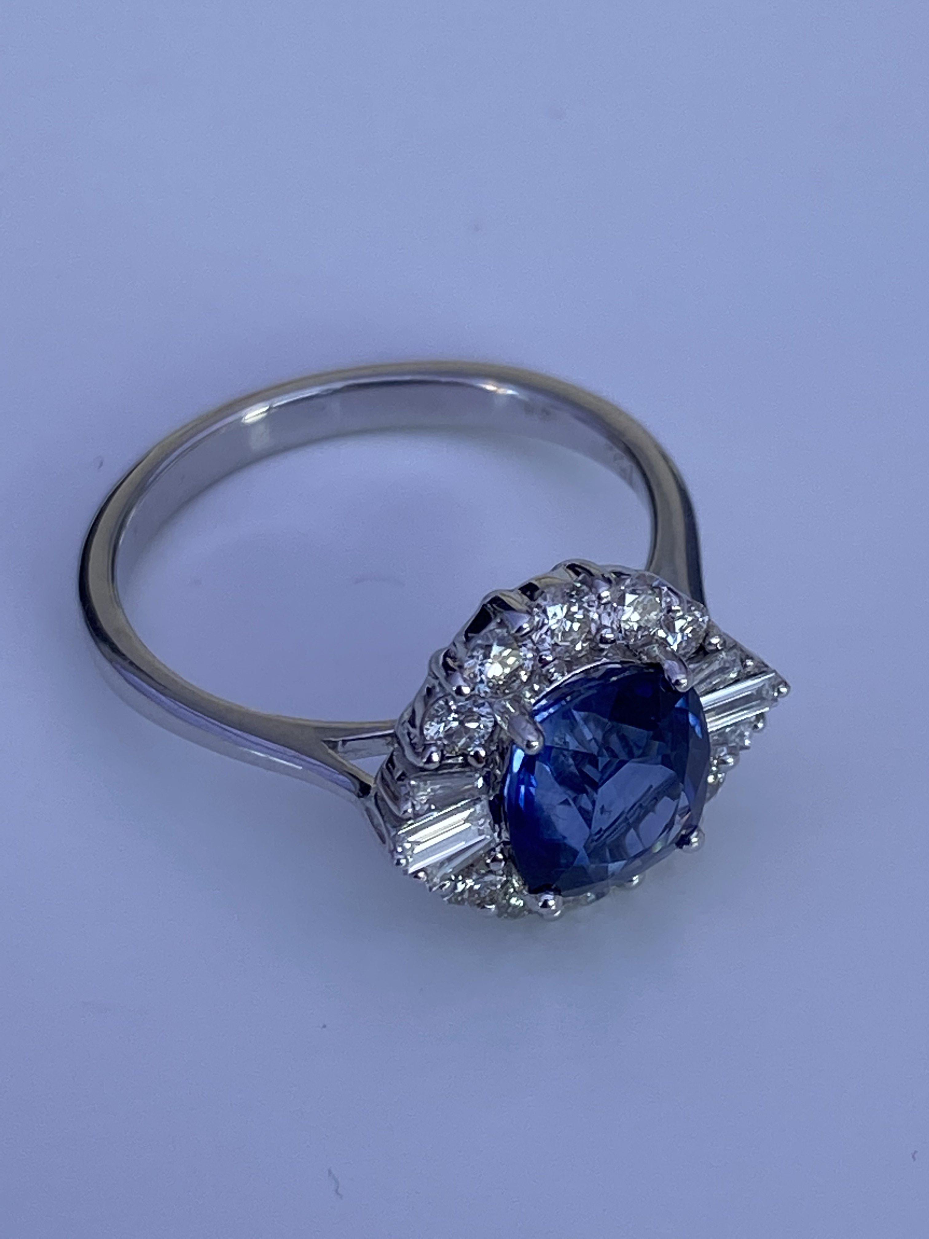 An 18ct white gold oval 1.73ct sapphire and 0.57ct