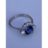 An 18ct white gold oval 1.73ct sapphire and 0.57ct
