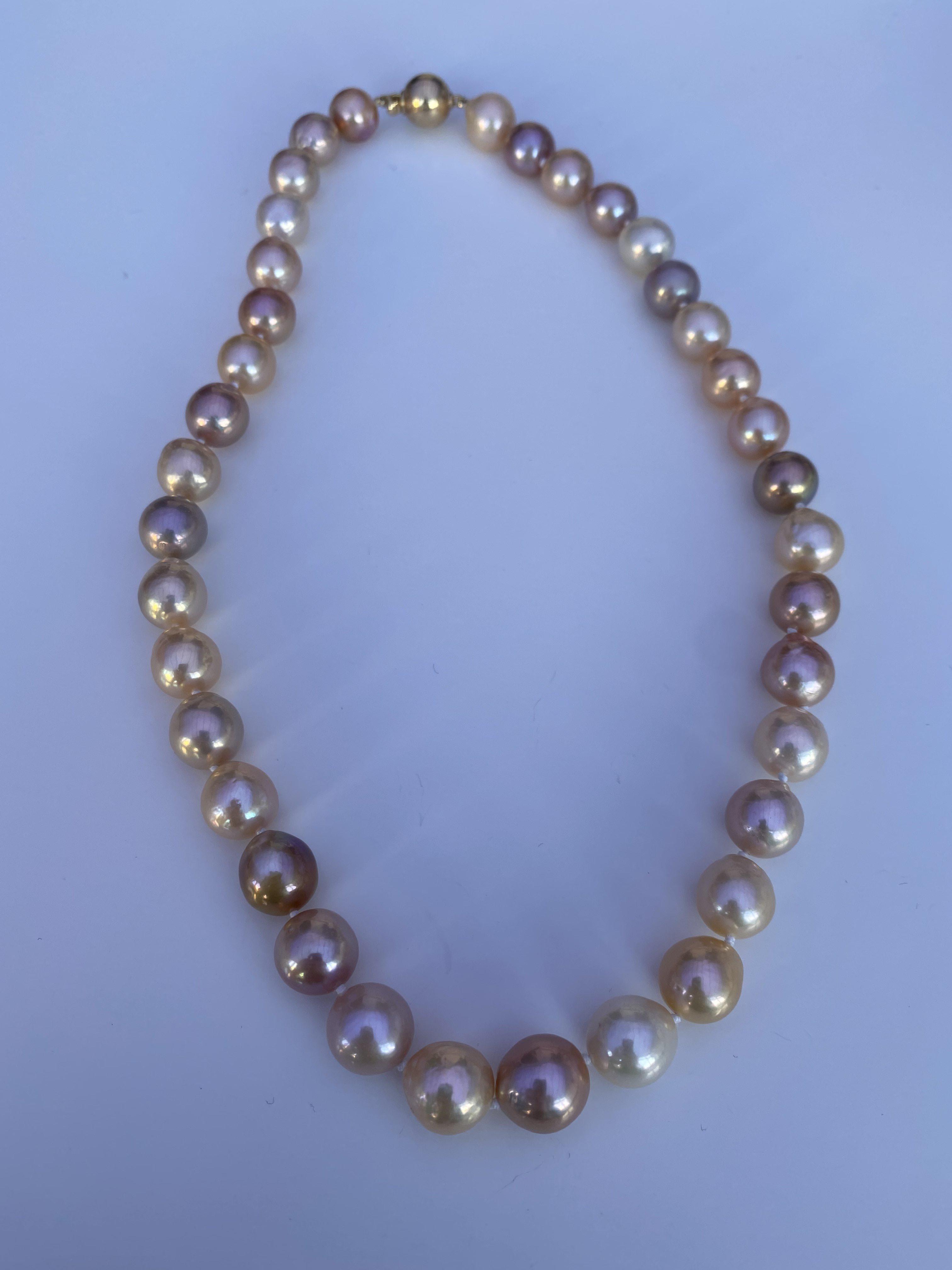 A string of large freshwater pearls with a 9ct gol