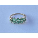 9ct gold and green stone cluster ring. (Possibly e