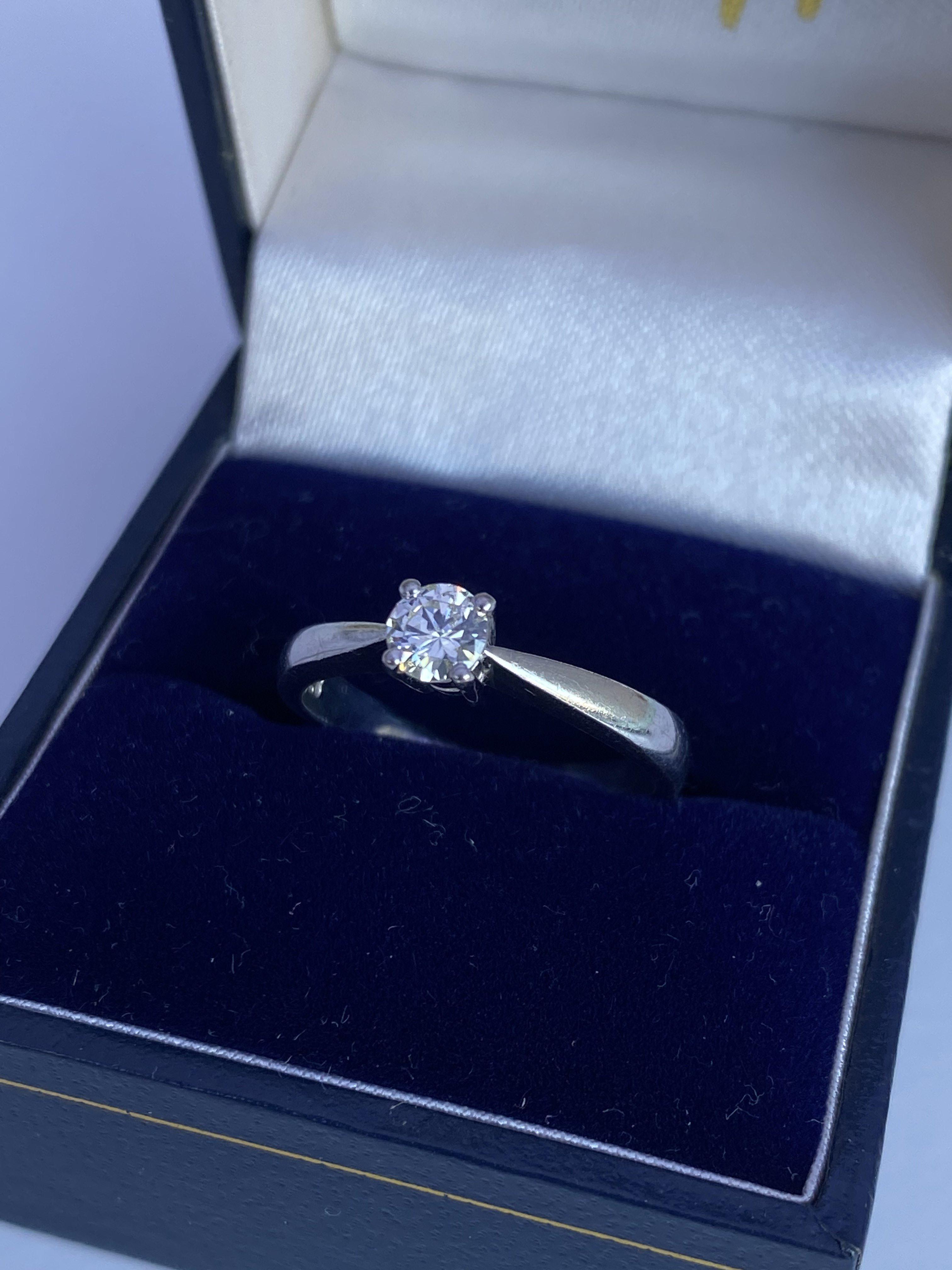 An 18ct white gold solitaire 0.28ct Ring with RBC