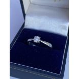 An 18ct white gold solitaire 0.28ct Ring with RBC