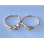 Two 9ct gold and diamond set rings. Approx 3g.