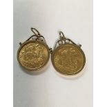 Two gold mounted earrings inset with half sovereig