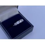 An 18ct white gold 4 stone RBC 1.30ct diamond ring