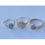 Three 9ct gold and stone set rings. Approx 7g.