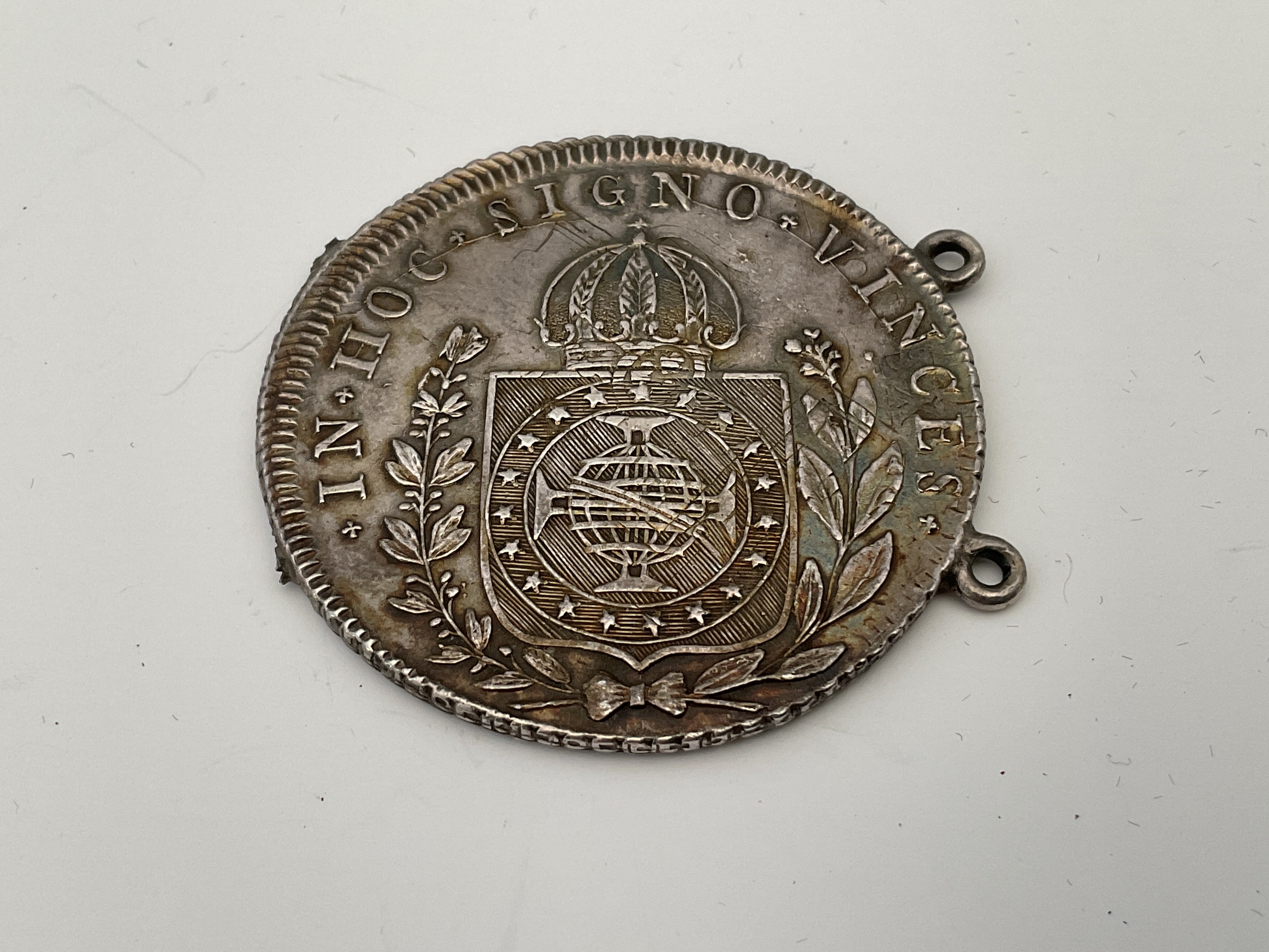 An 1825 960 Brazilian Silver Reis, later links sol