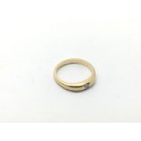 An unmarked gold diamond solitaire ring, approx 4.