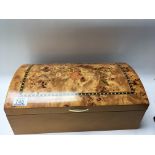 A large dome top jewellery box with marquetry deco