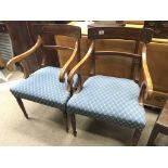 A pair of quality Edwardian scroll open arm chairs