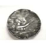 An Art Nouveau metal card dish depicting a maiden