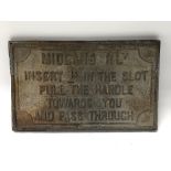 A Midland Railway cast iron sign giving directions