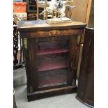 A walnut veneered pier cabinet with fruit wood inl