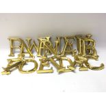 A collection of 20 gilt wood letters. 12cm.