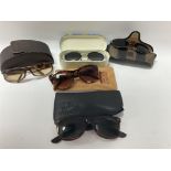 Five pairs of designer sunglasses with cases & bag