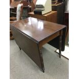 A mahogany drop leaf table, approx 160cm x 102cm x