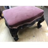 A pair of Victorian foot stools with upholstered t