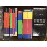 Seven Harry Potter books including four first edit