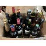 A collection of 22 bottles wines and other alcoholic beverages varied age and conditions.