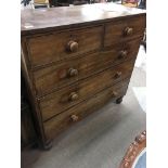 A mahogany chest of drawers fitted with two short and three long drawers