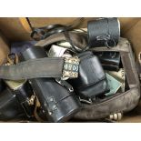 A Box Containing Film cameras various with lenses