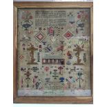 A Victorian sampler dated 1856, approx 60cm x 69cm