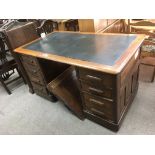 A walnut desk inset with leather top, approx 140cm