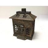 An Early cast iron bank money box ( 1section missi