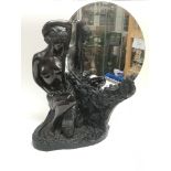 A spelter figural table mirror decorated with an Art Deco style flapper girl, approx height 36cm.