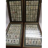Twelve framed collections of cigarette cards plus