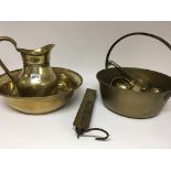 A collection of brass ware including a preserve pa