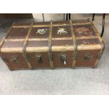 A larger wooden bound travelling trunk, approx 91cmx54cm.