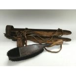 A pair of circa 1921 Dutch Nordster tie on ice skates and a 1920s clothes brush (3).