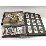 A collection of cigarette cards including sets.