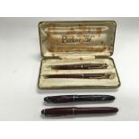 Two Queen Elizabeth II Coronation pens and two Osm