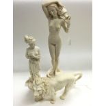 Three alabaster figures comprising large and small figures of Aphrodite and one of a lion (3), the